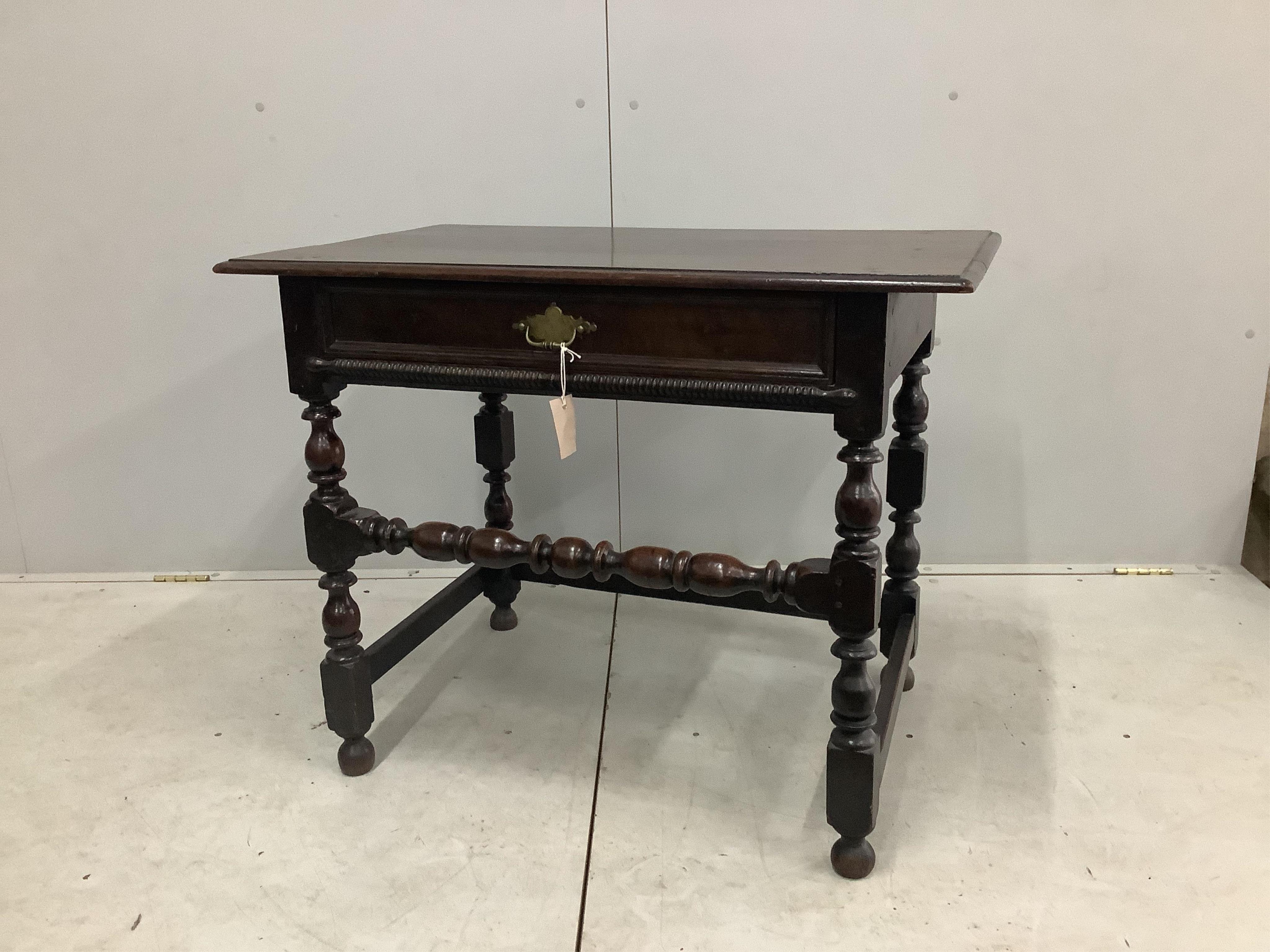 A 17th century and later oak side table, width 91cm, height 2cm. Condition - good, colour of top doesn't match underframe